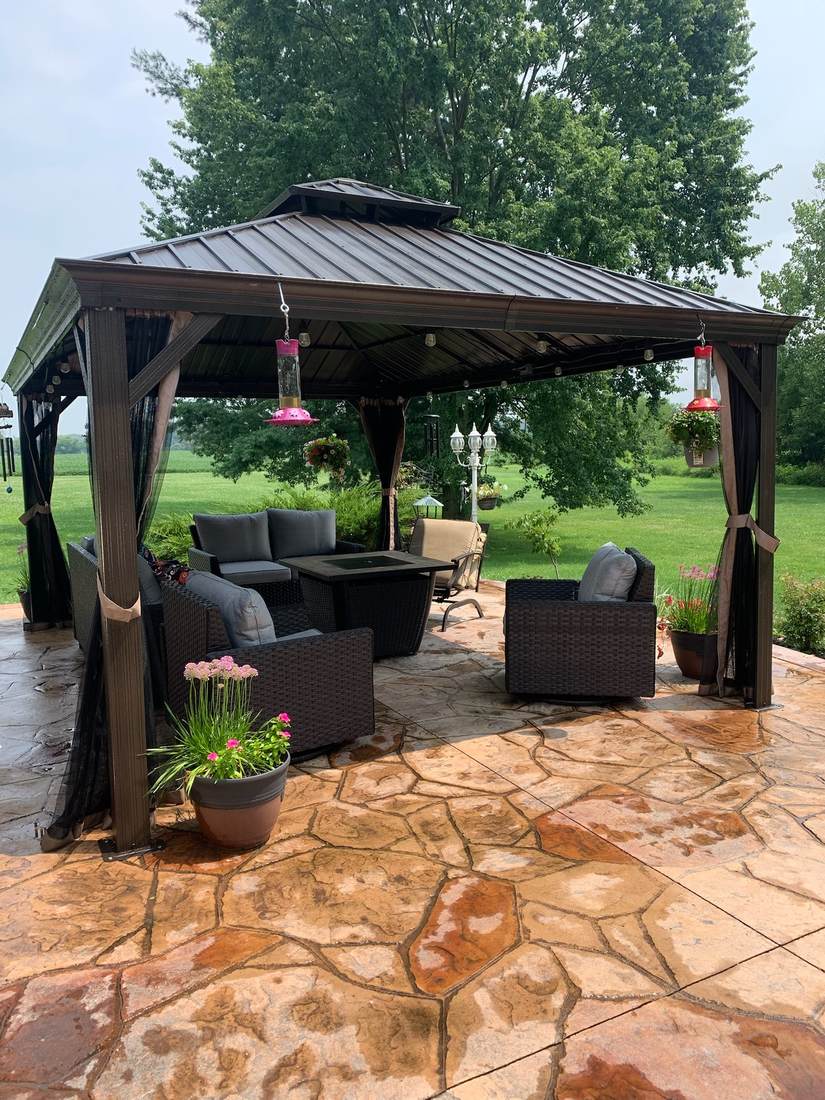 Stained flagstone patio under the gazebo