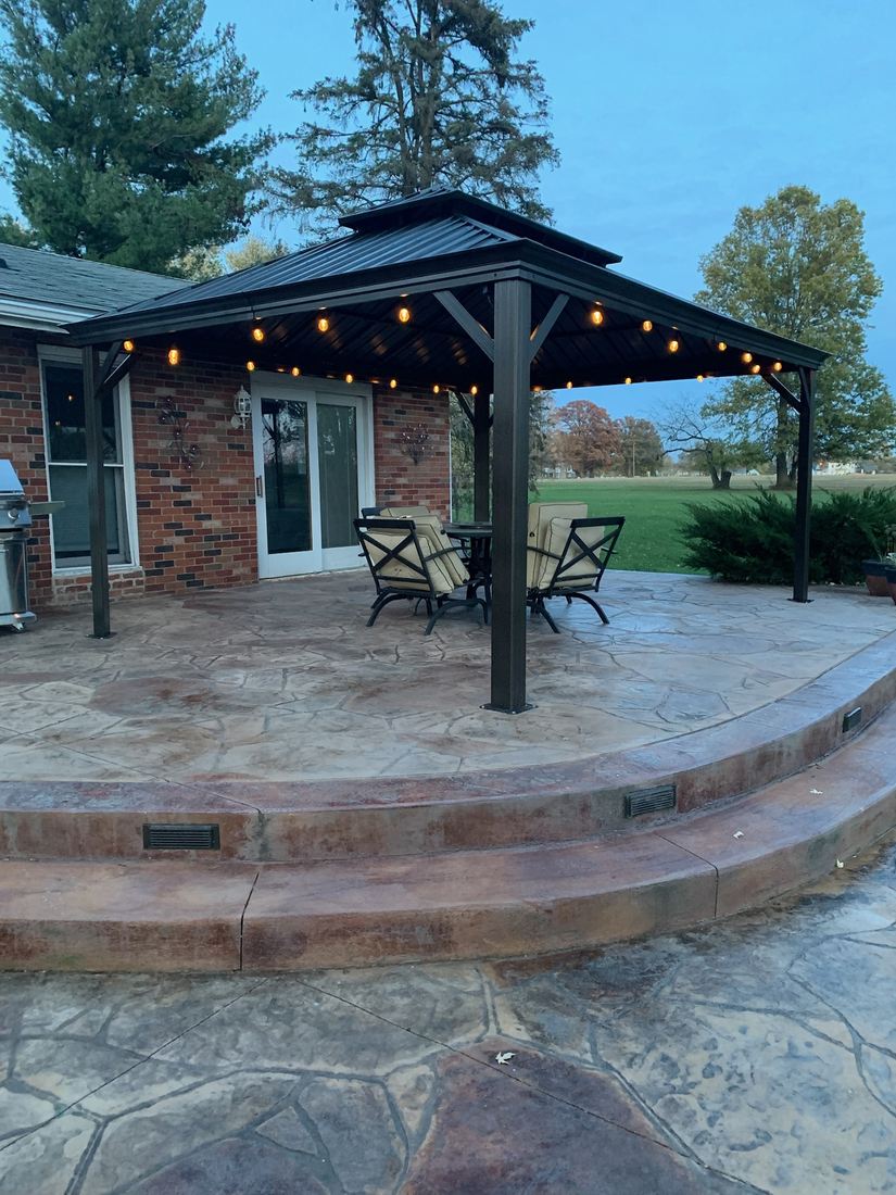 Stamped patio with curved steps