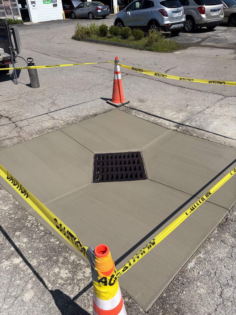 Sunken catch basin rebuilt and repoured