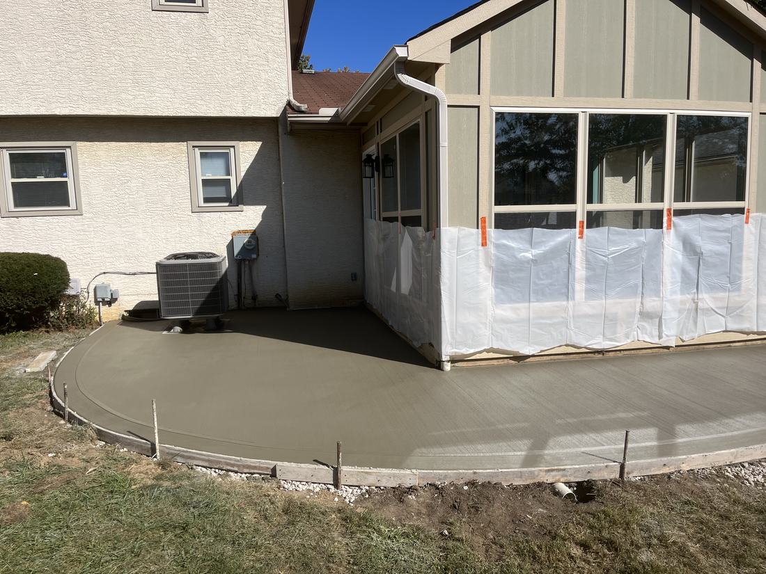 Curved patio off the sunroom