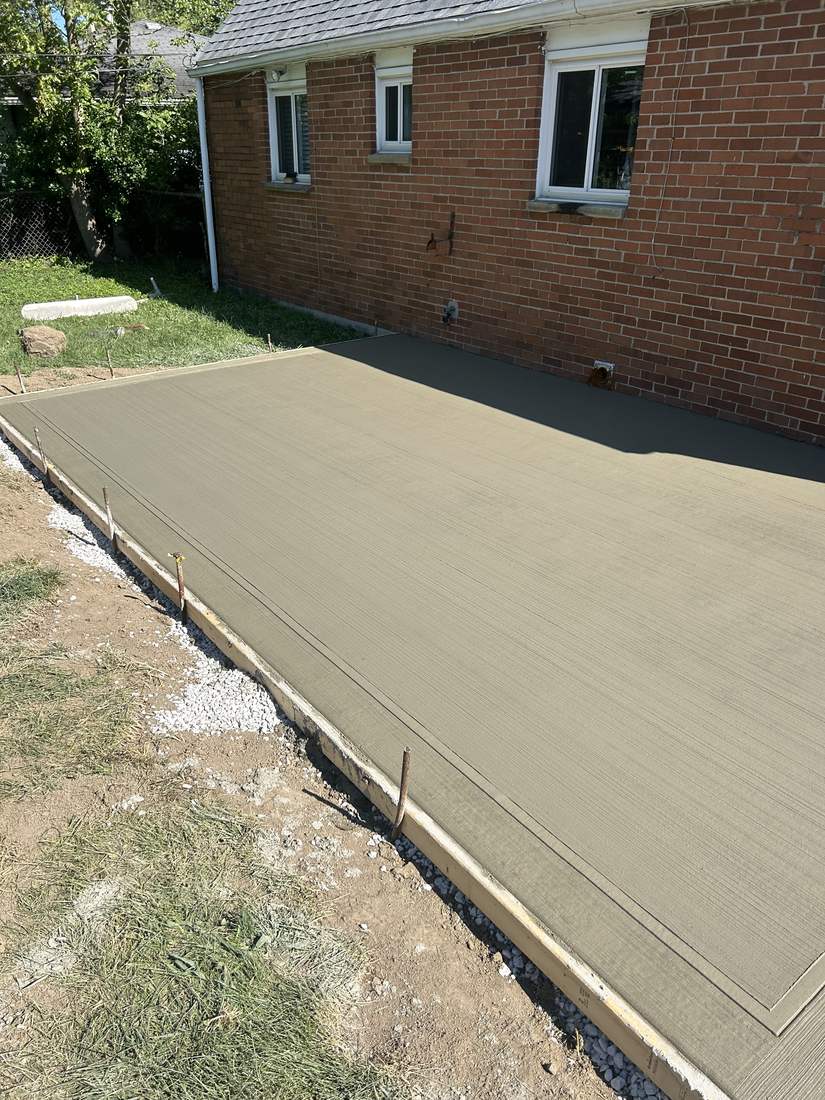 Long patio along the brick ranch