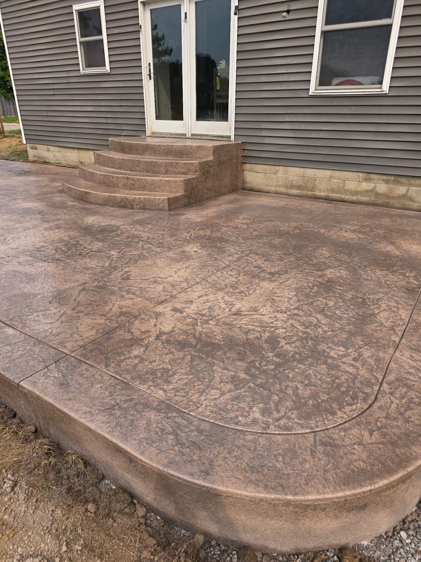 Stamped patio and rounded steps