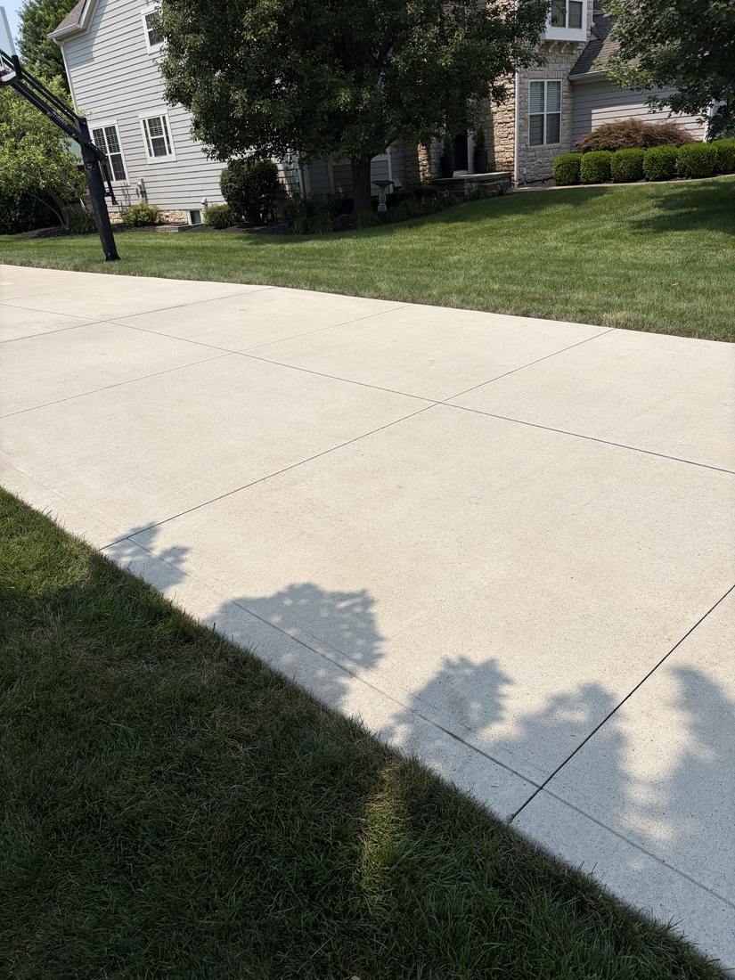 Driveway washed out to the curb