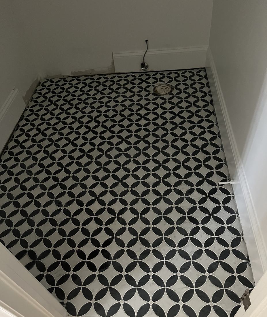 Marble mosaic floor set wall to wall