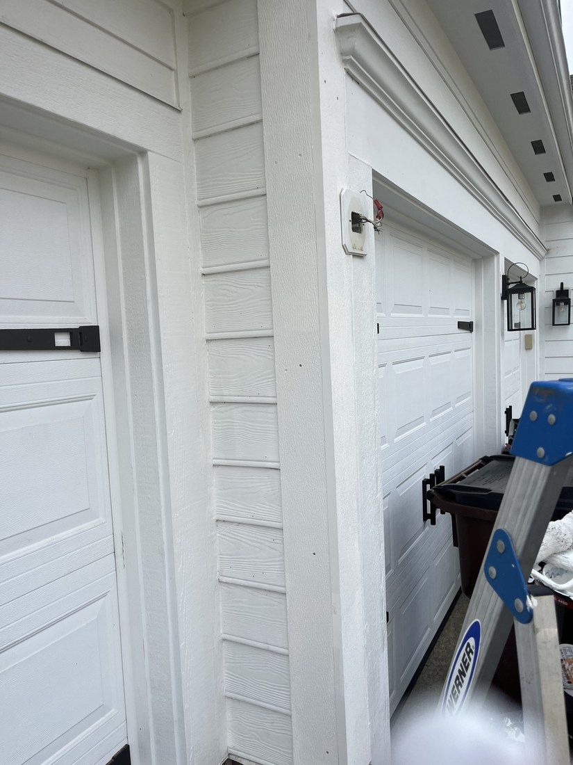 Rotted garage trim rebuilt