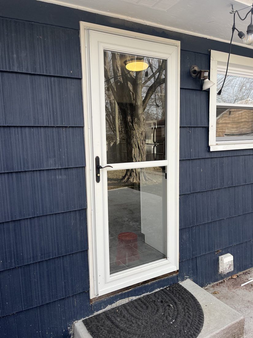 Entry door on cedar shake